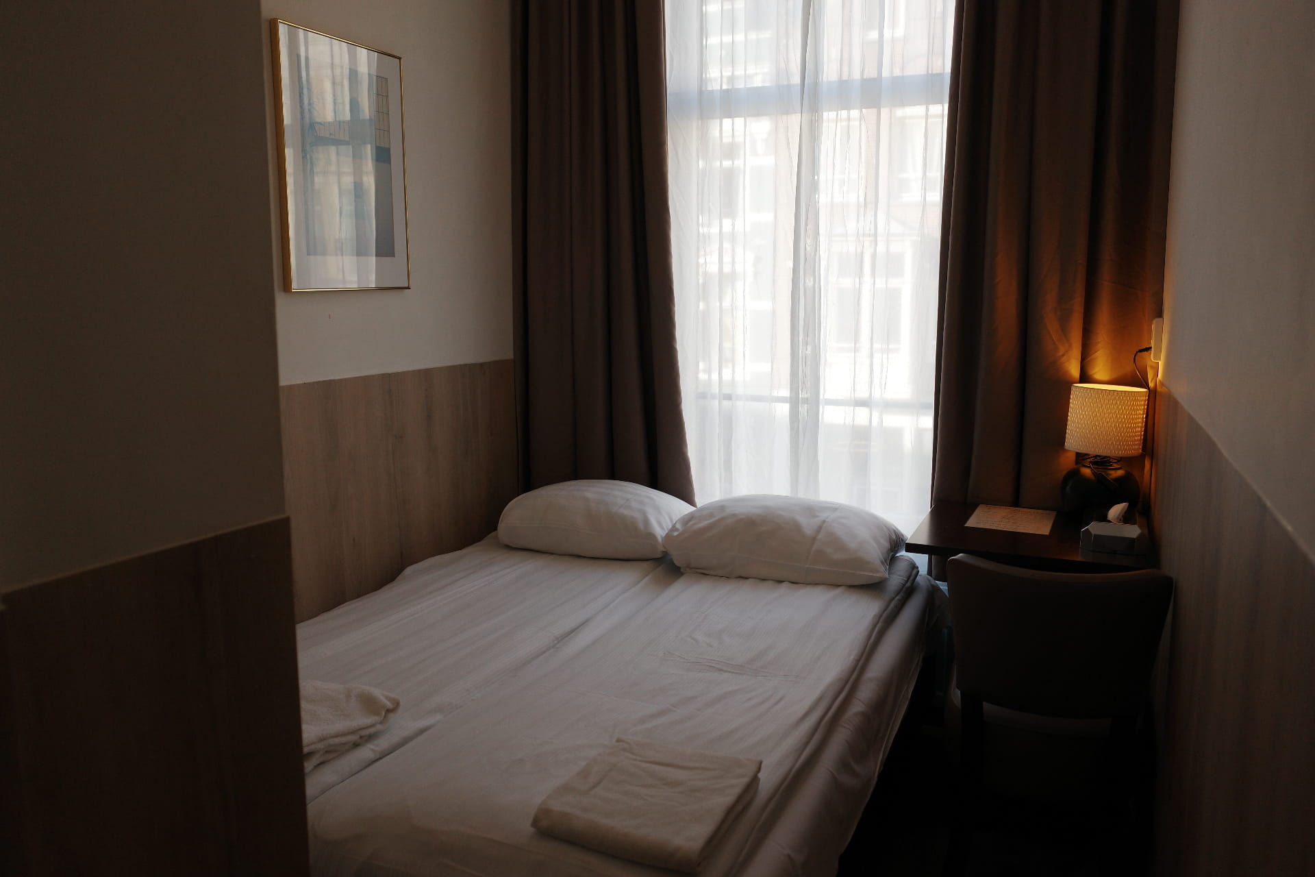 Compact Room with Warm Bedside Light